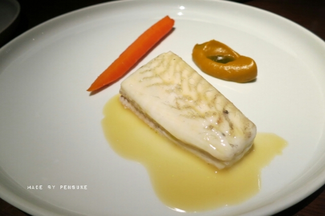 Steamed flounder with roasted carrot and kelp oil.